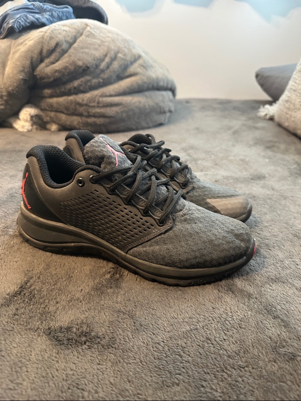 Jordan Black Sneakers with Red Jumpman Accent